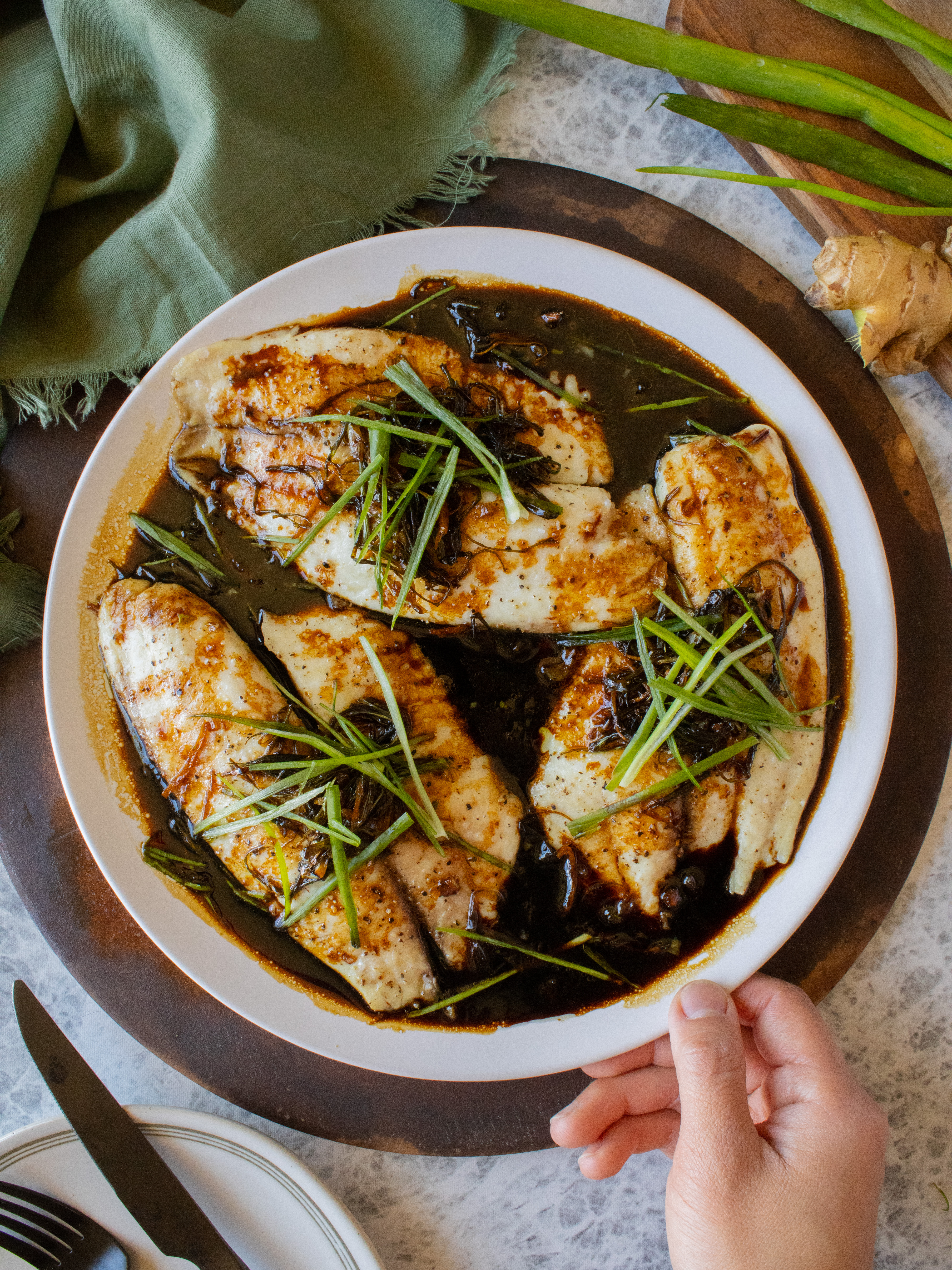 overhead shot of Easy Ginger Scallion Tilapia on a plate