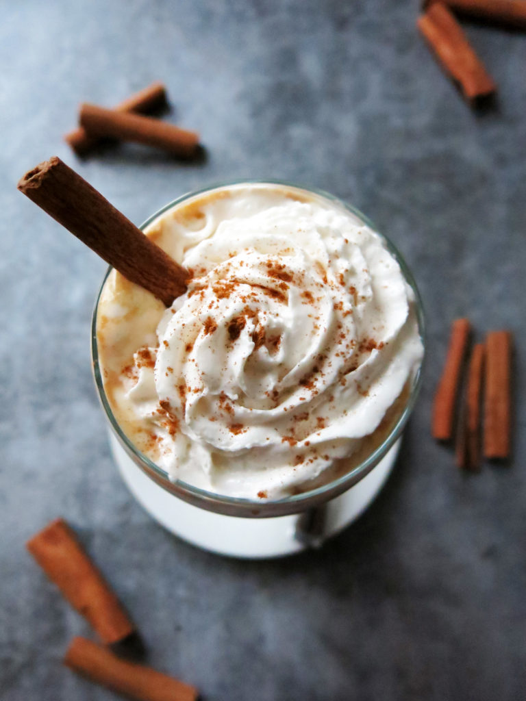 DIY Pumpkin Spiced Lattés overhead shot with cinnamon stick