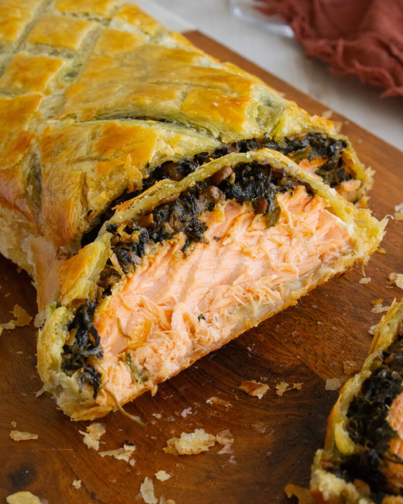 close up slice of Salmon Wellington