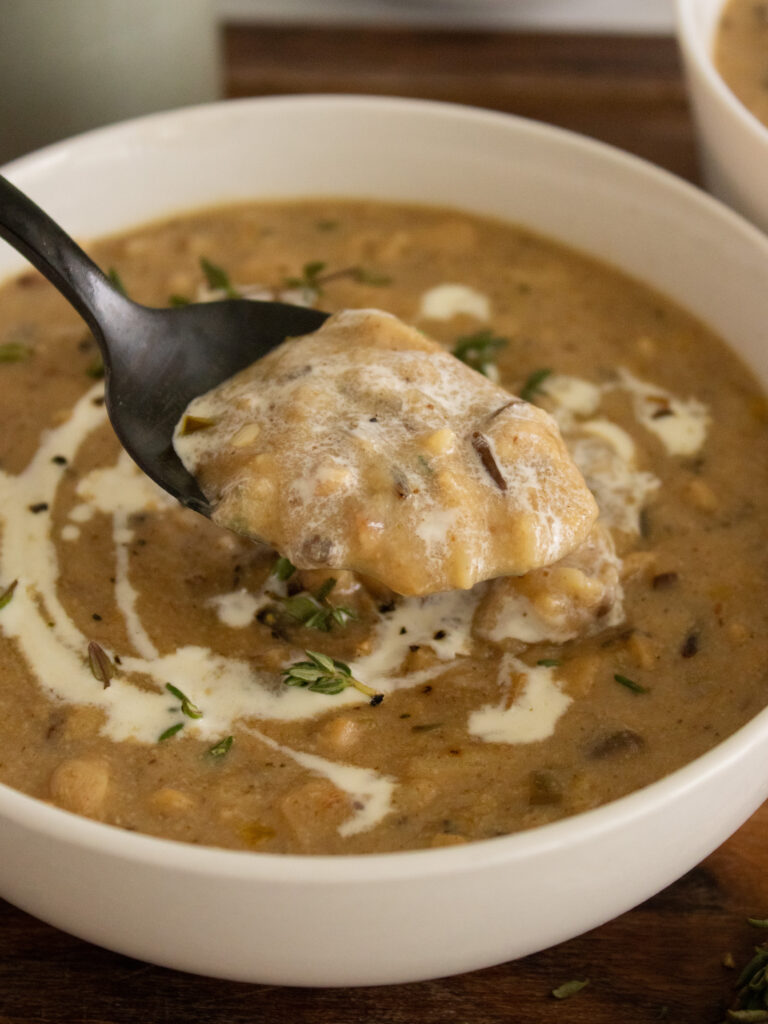 close up of a spoonful of Creamy Mushroom Wild Rice Soup