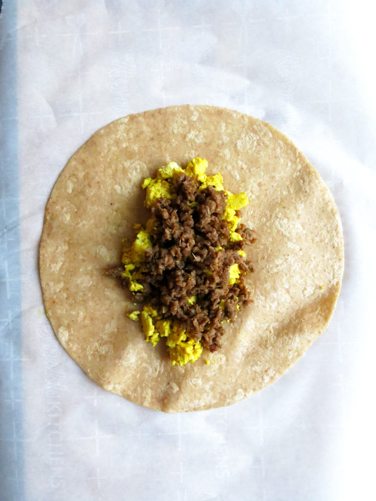 Cross section of Vegan Breakfast Burritos with breakfast sausage