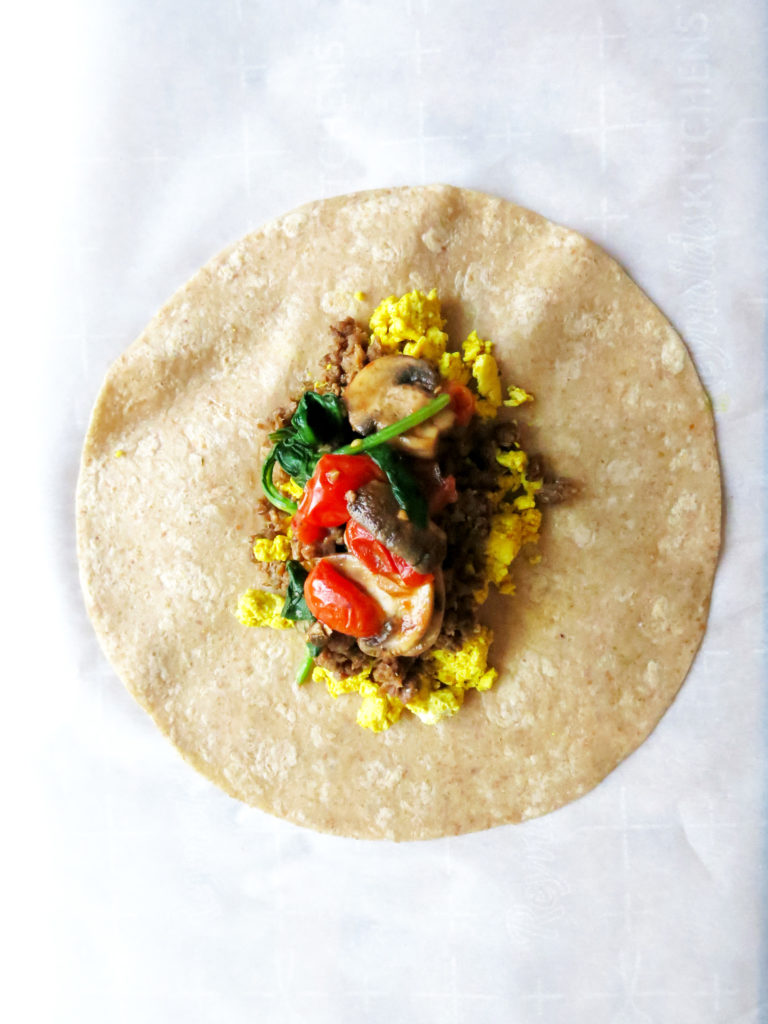 Cross section of Vegan Breakfast Burritos with vegetables