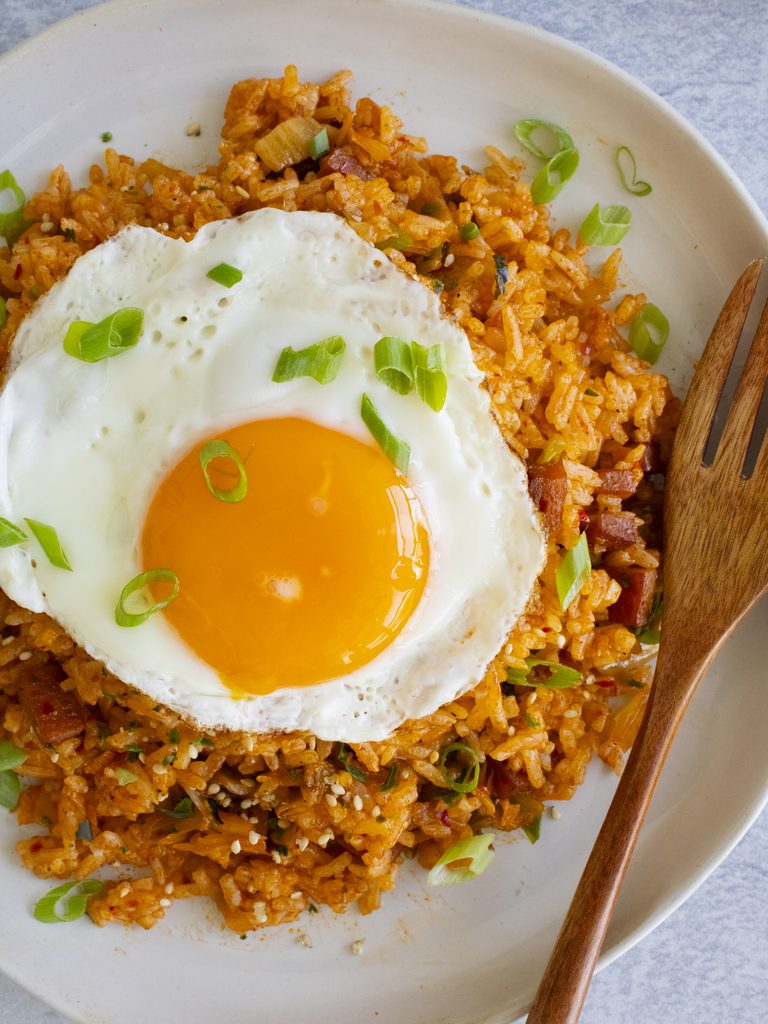 overhead photo of kimchi fried rice with a fried egg on top