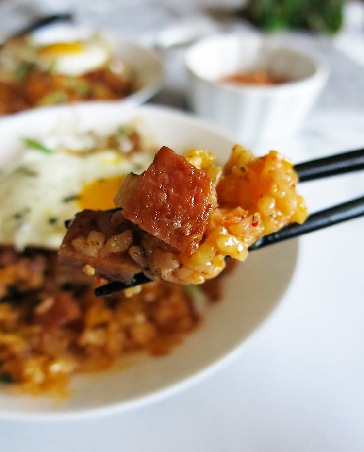 Kimchi fried rice on chopsticks