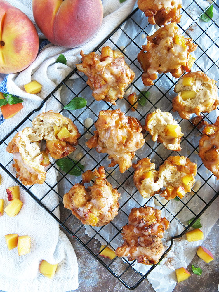 Peach fritters on wire rack