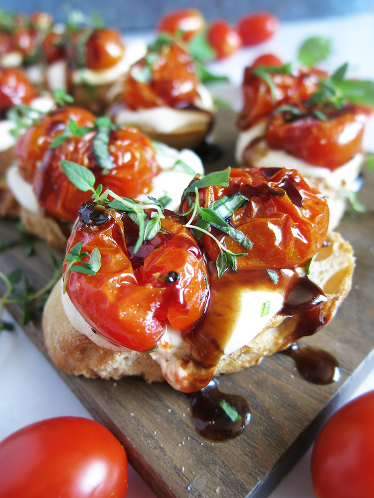 Whipped Feta and Ricotta Crostini with Roasted Tomatoes.