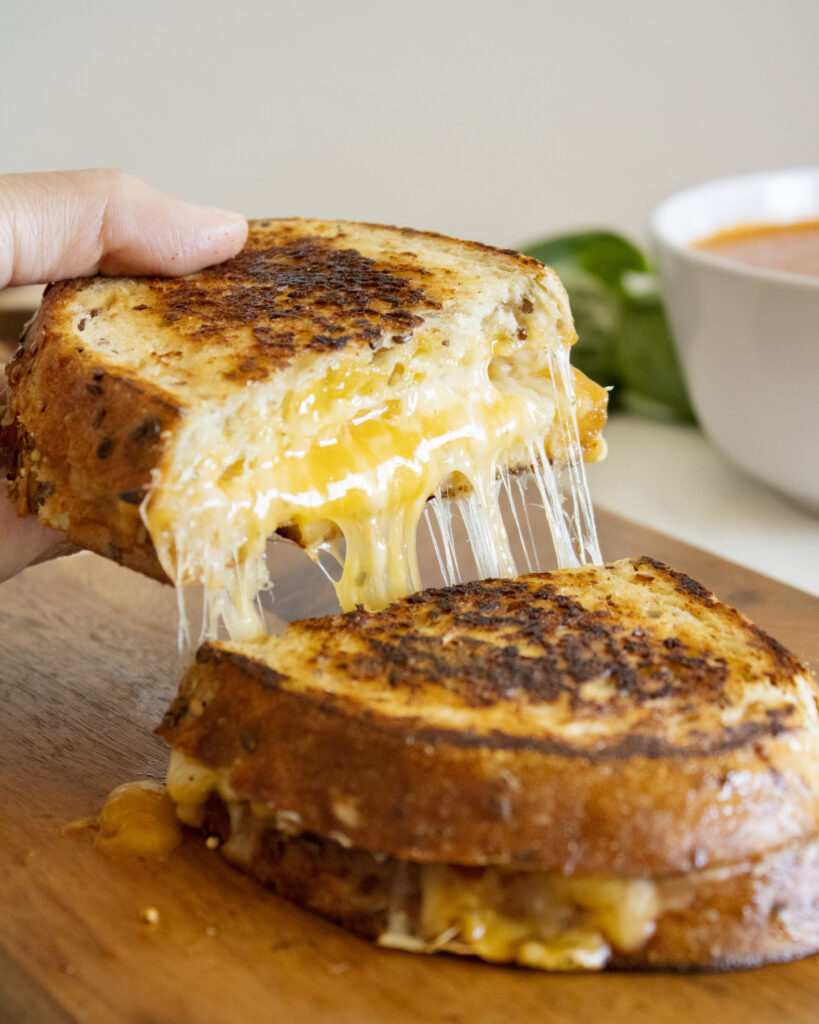 Cheese pull shot of Grilled Cheese
