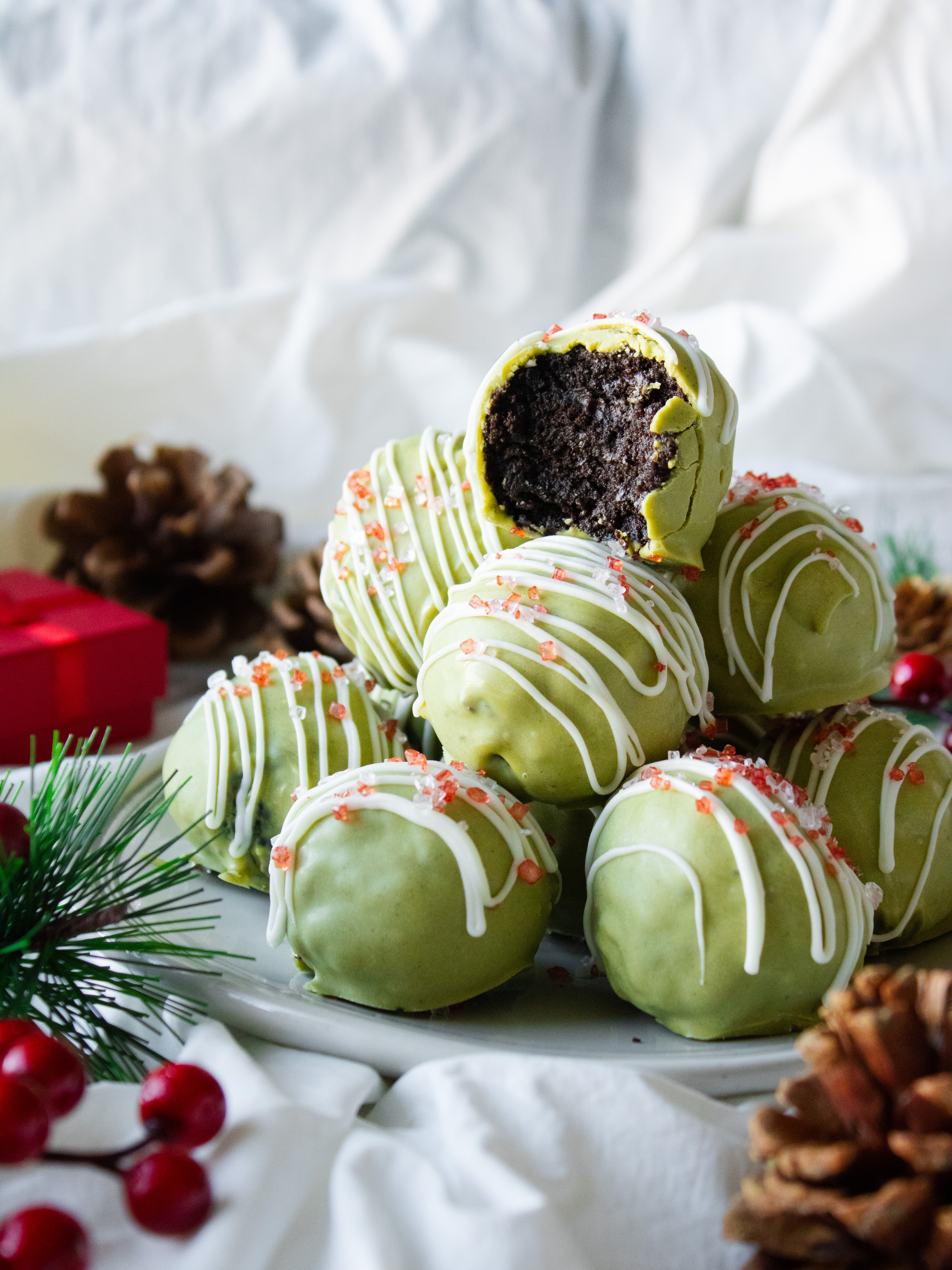 Matcha Oreo Truffles Stacked on a plate