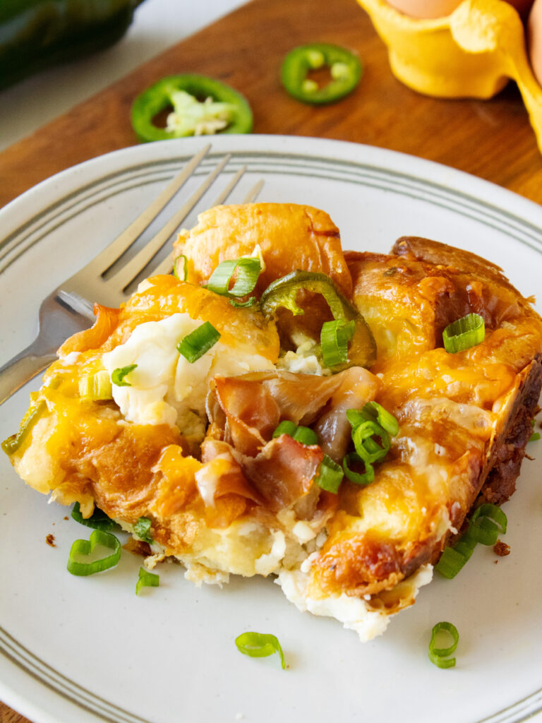 Serving of Cheesy Jalapeño Croissant Bake on a plate