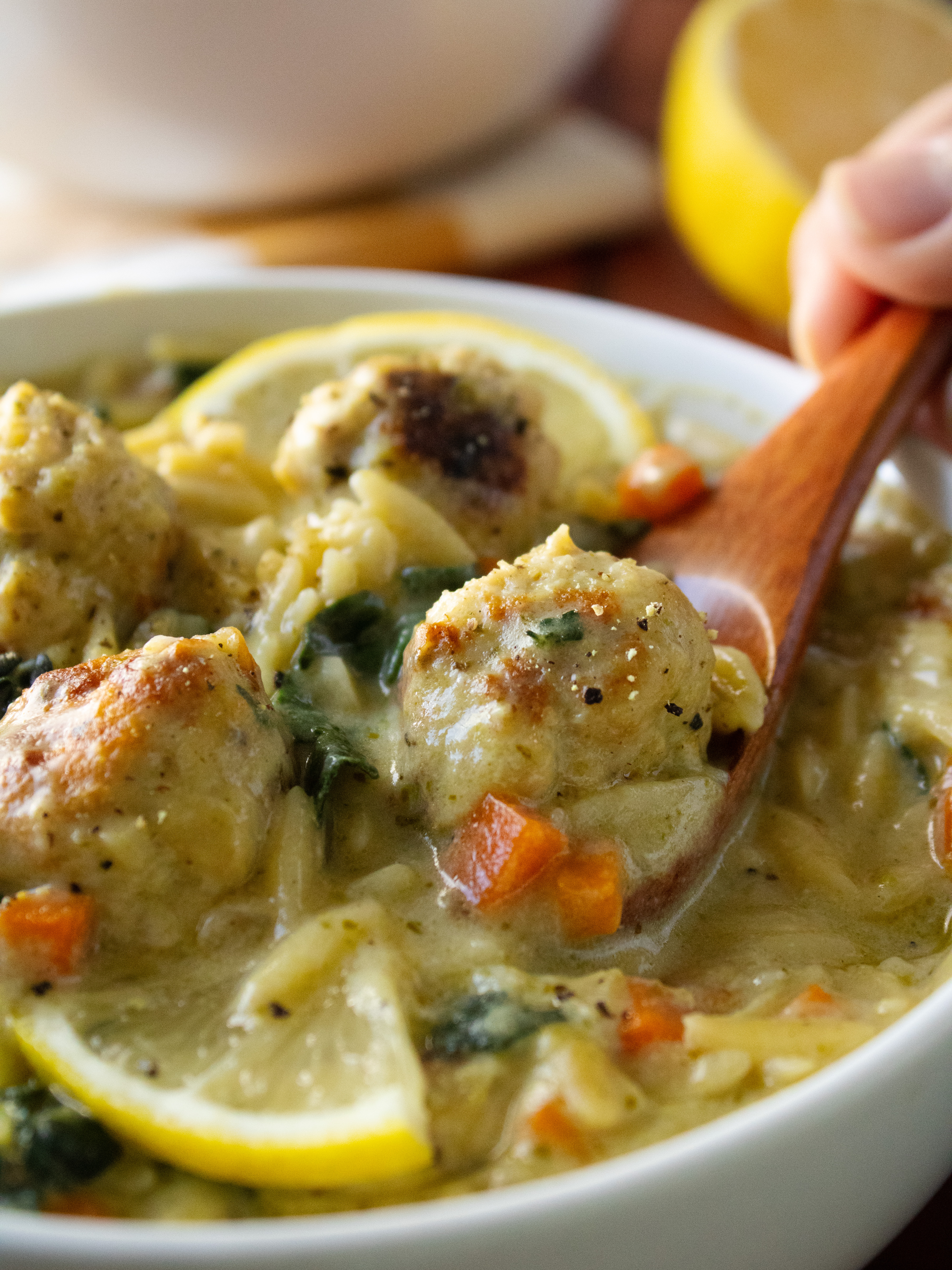 close up of Orzo Pesto Meatball Soup