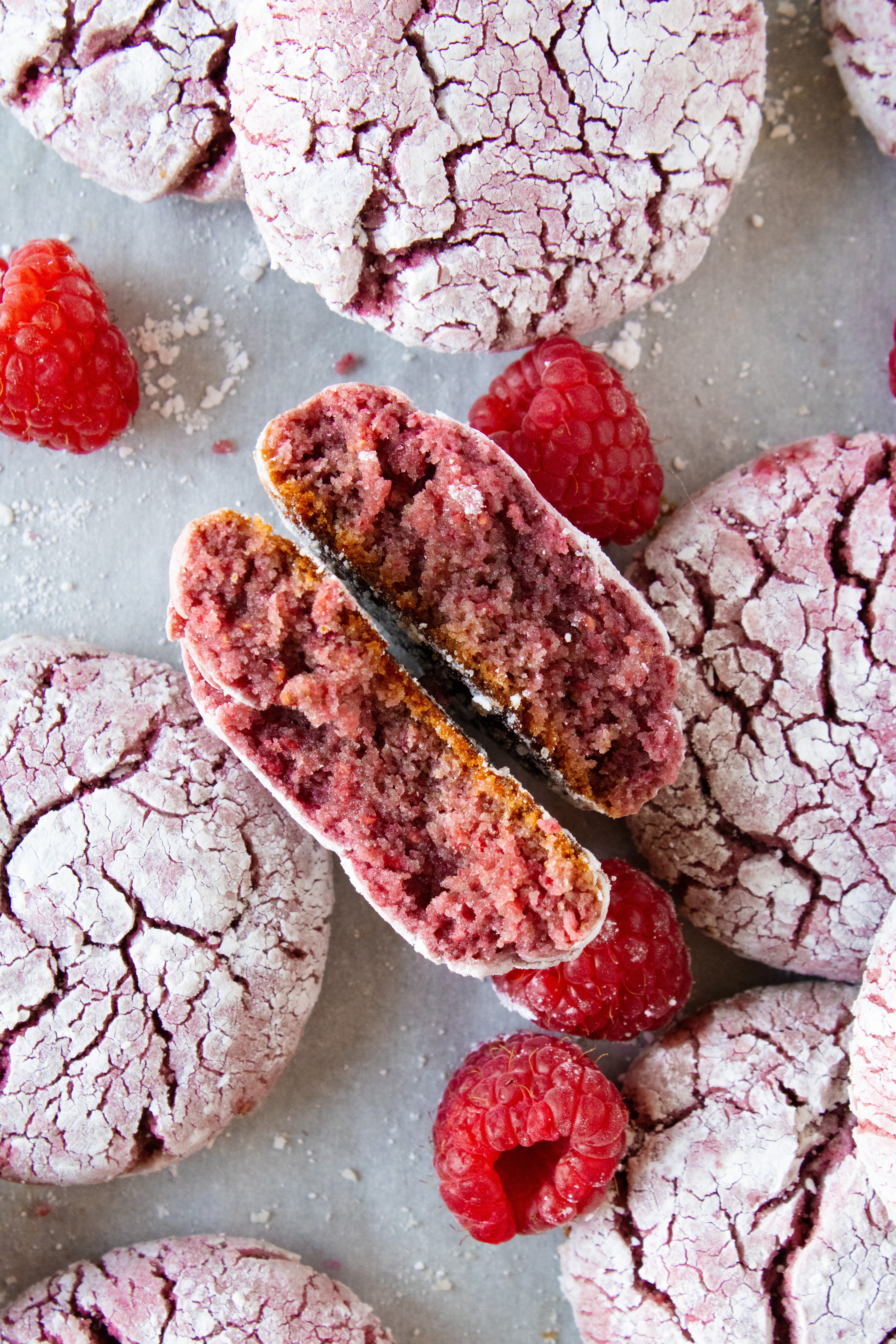 Top down shot of raspberry crinkle cookie cross section