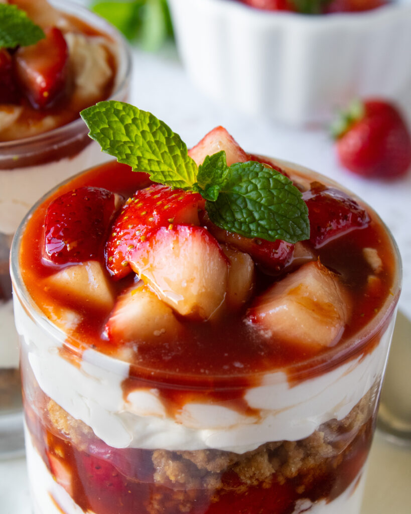 close up shot of the strawberry guava on top of Strawberry Guava Cheesecake Parfaits