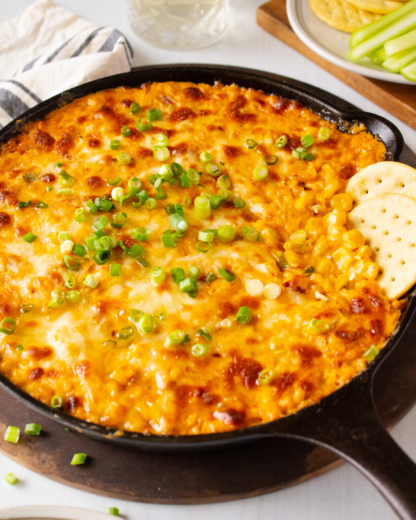 kimchi corn cheese dip in cast iron skillet