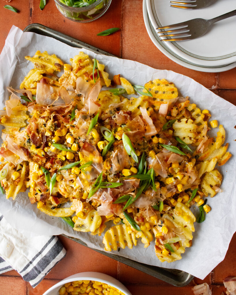 overhead shot of Japanese Cheese Fries on a baking sheet