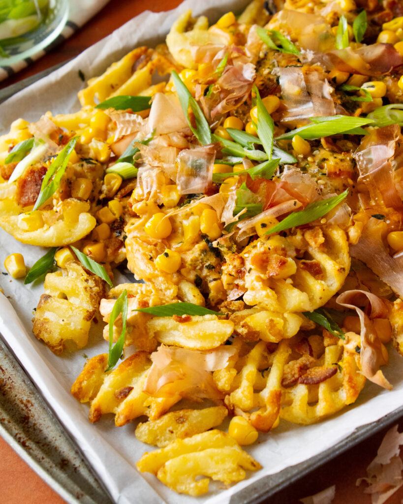 close up 45 degree angle of Japanese Cheese Fries on a Baking Sheet