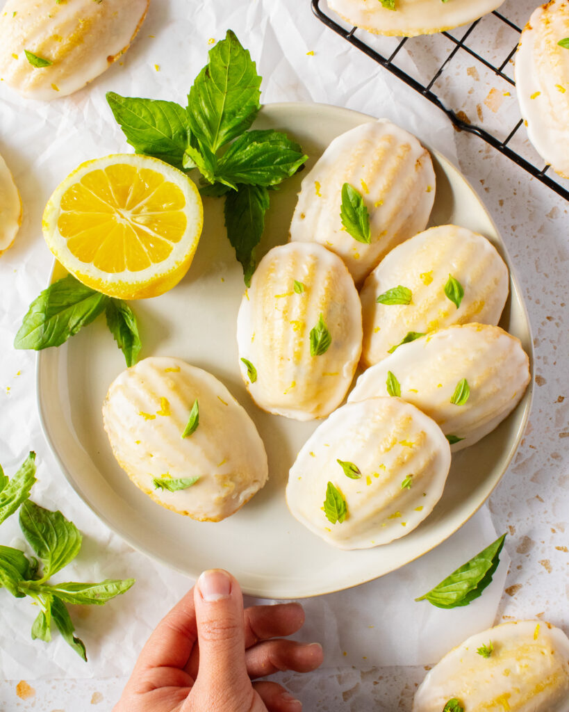 top down shot of Lemon Olive Oil Basil Madeleines on a plate