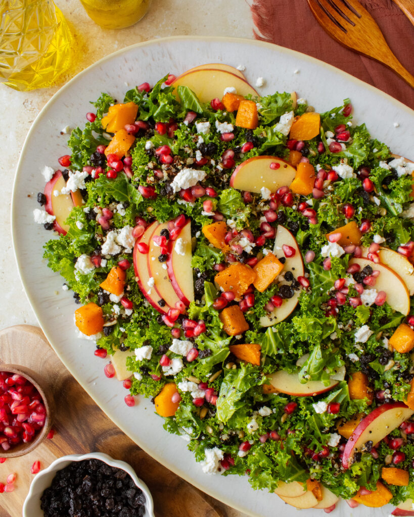 overhead shot of Fall Harvest Kale Salad on platter