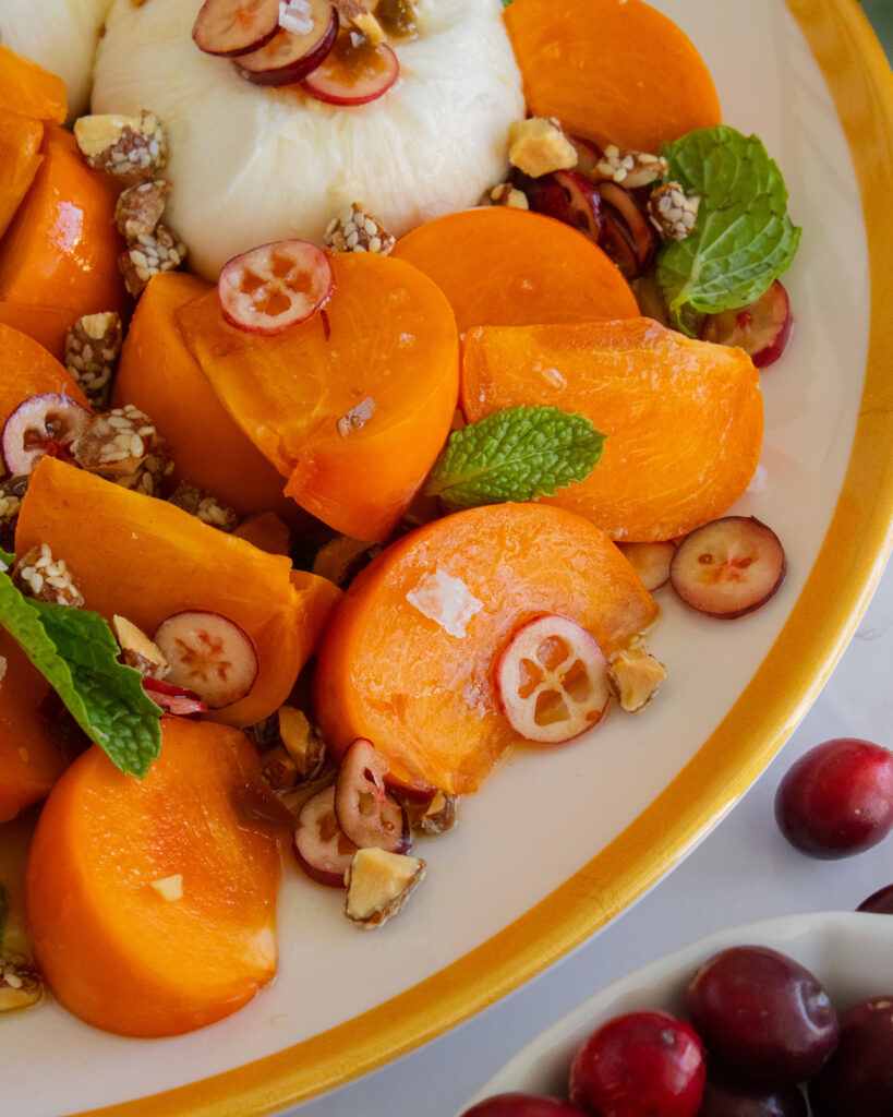close up of persimmons in Persimmon Burrata Salad