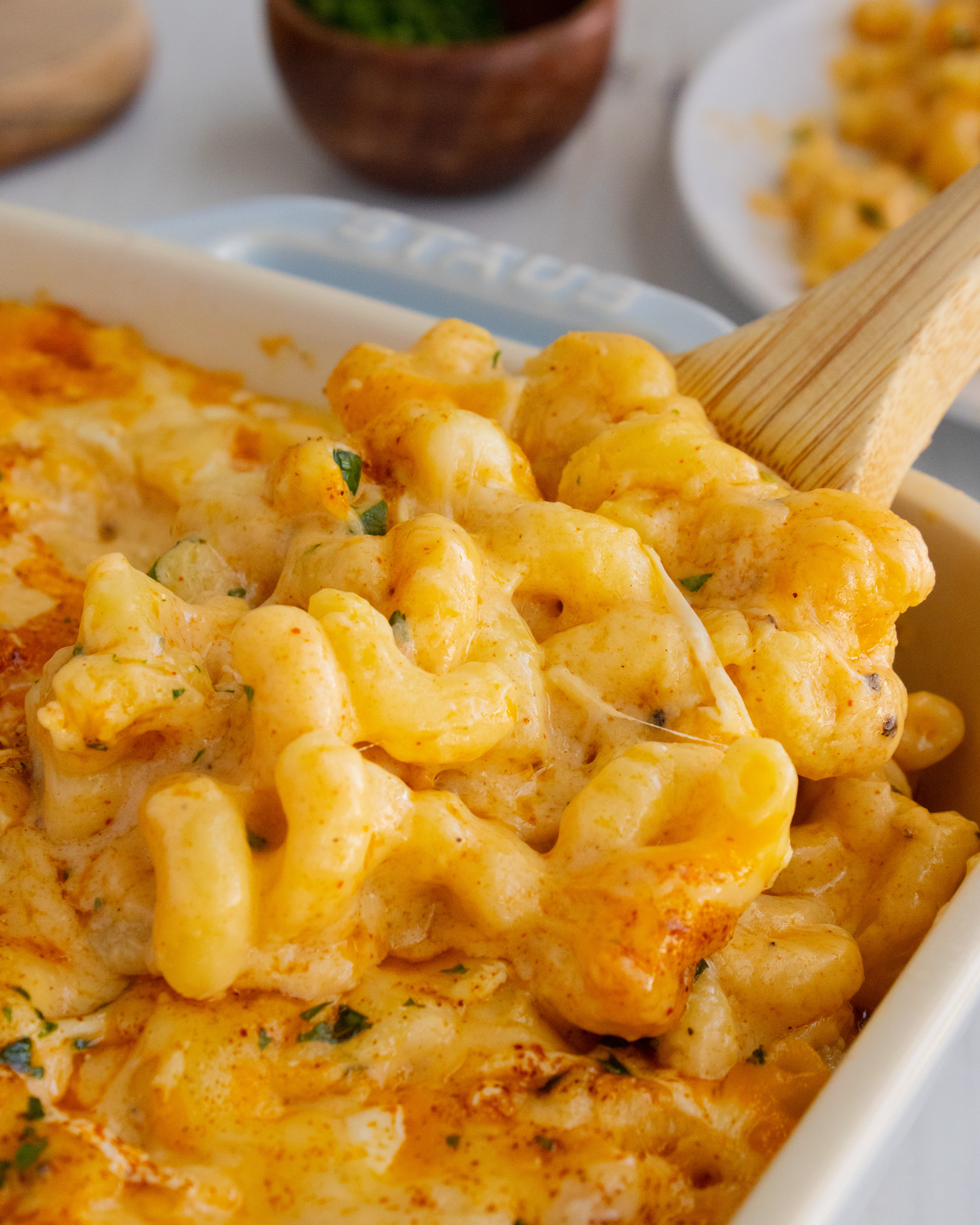 close up of scoop of smoked mac and cheese