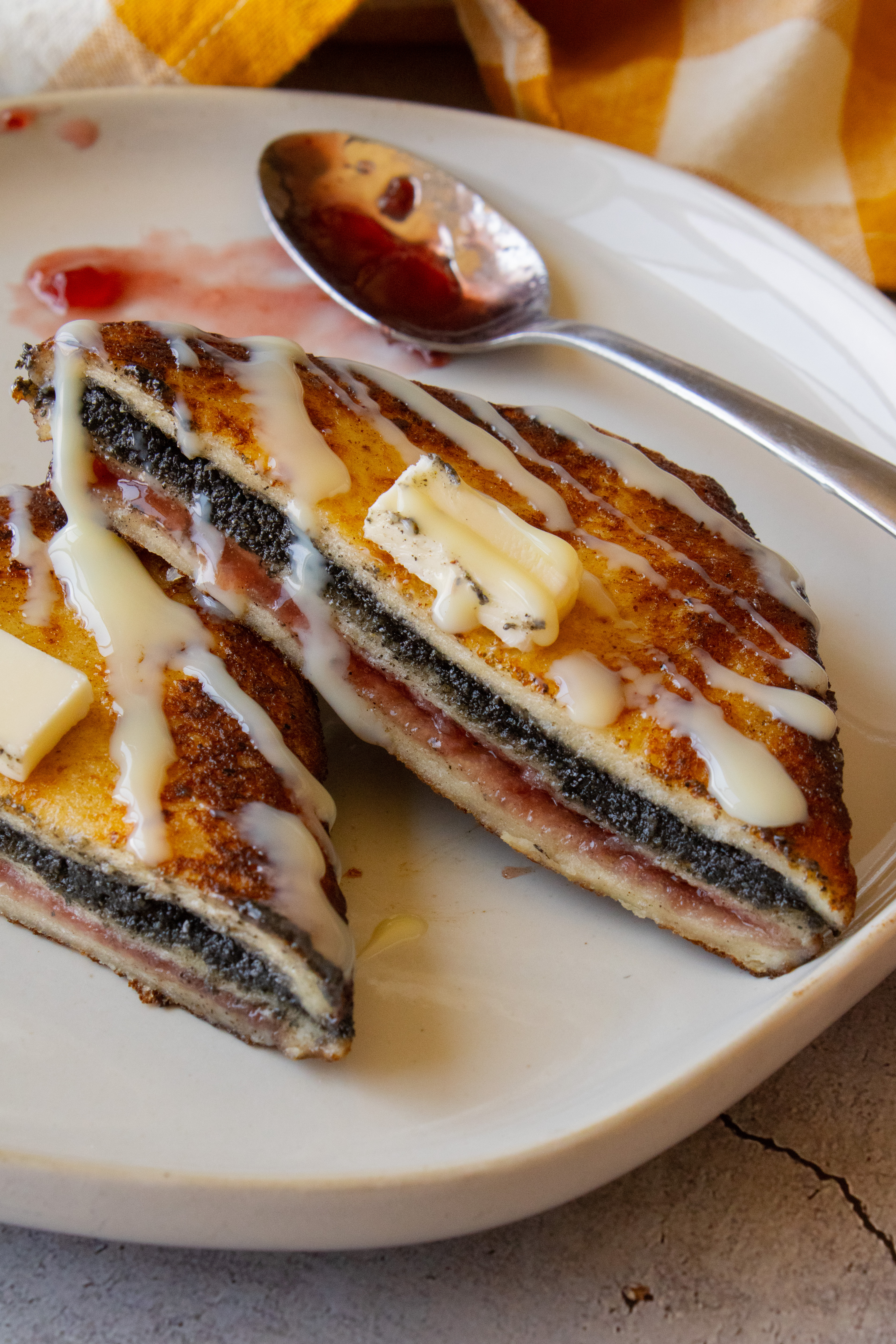 close up of one half of Black Sesame Raspberry Hong Kong Style French Toast