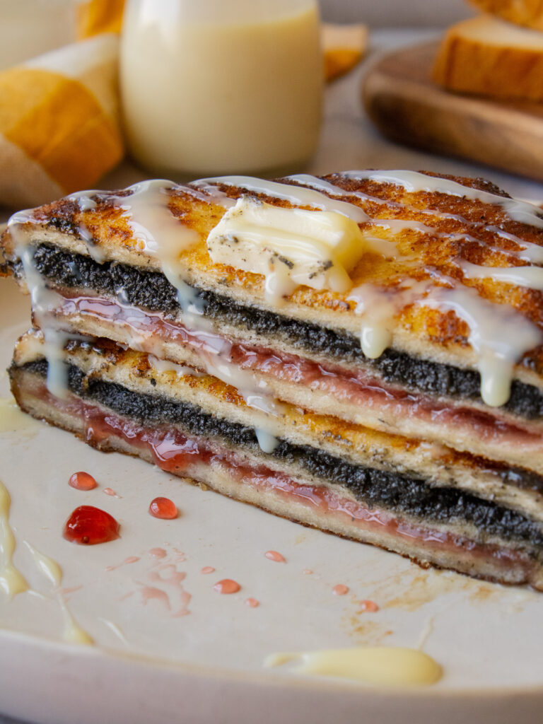 close up of layers ofBlack Sesame Raspberry Hong Kong Style French Toast