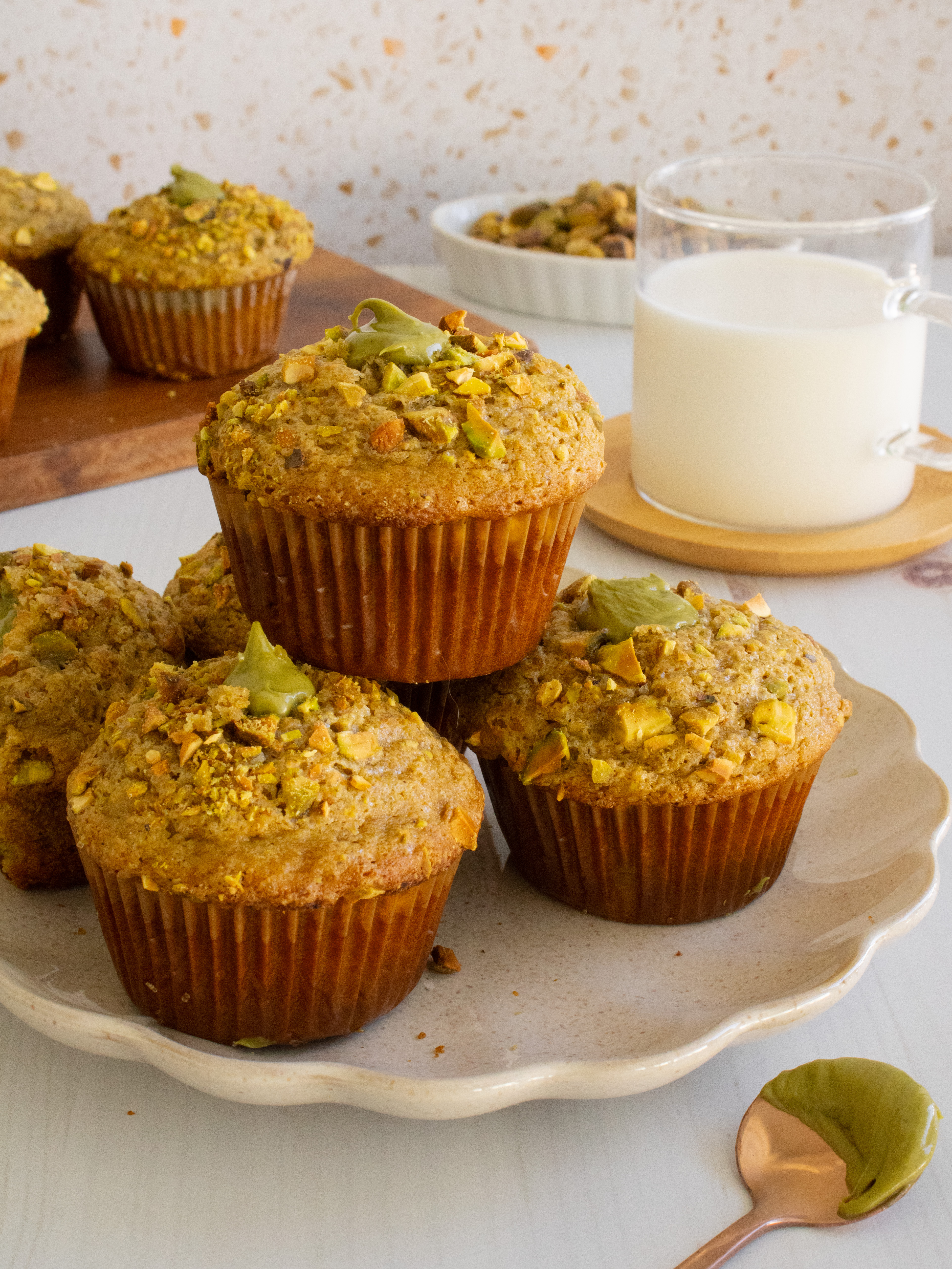 stack of Pistachio Cream Muffins on a plate
