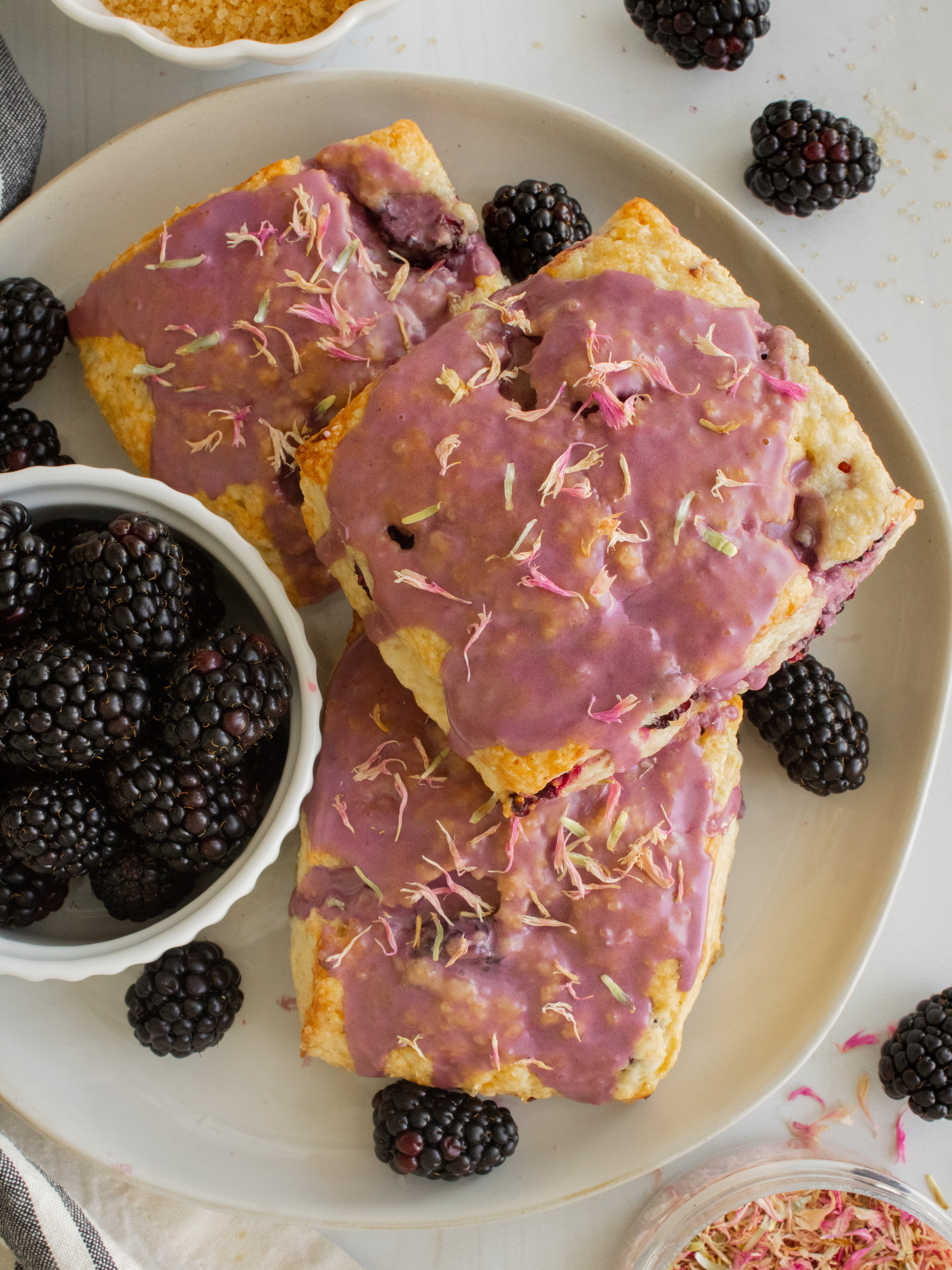overhead shot of Blackberry Earl Grey Scones on a plate