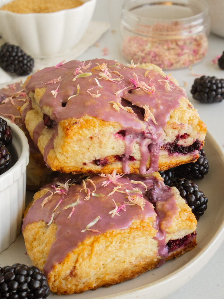 close up of Blackberry Earl Grey Scones on a plate