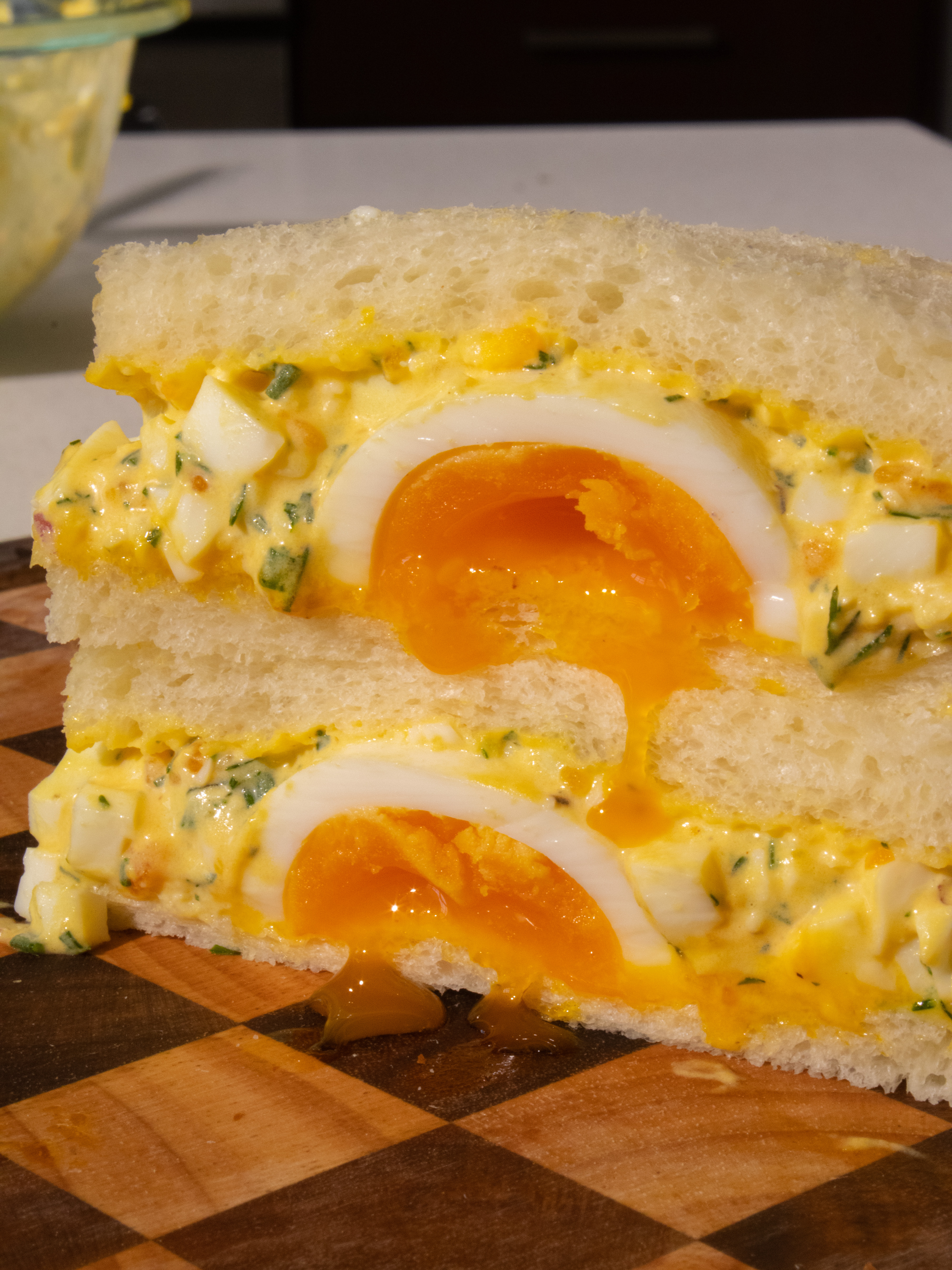 close up of Jammy Egg Salad Sando cross section