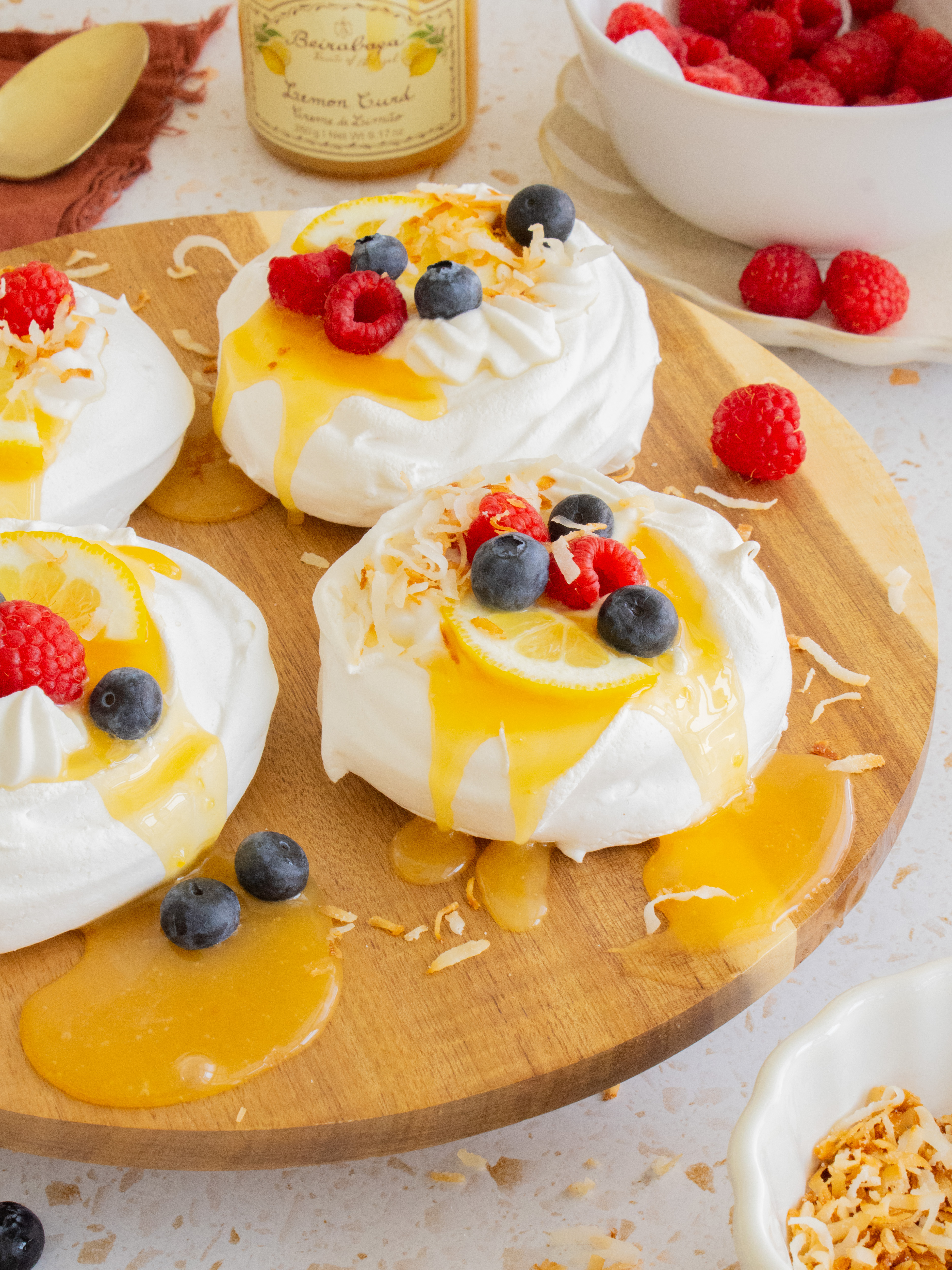 Lemon Coconut Mini Pavlovas on serving platter