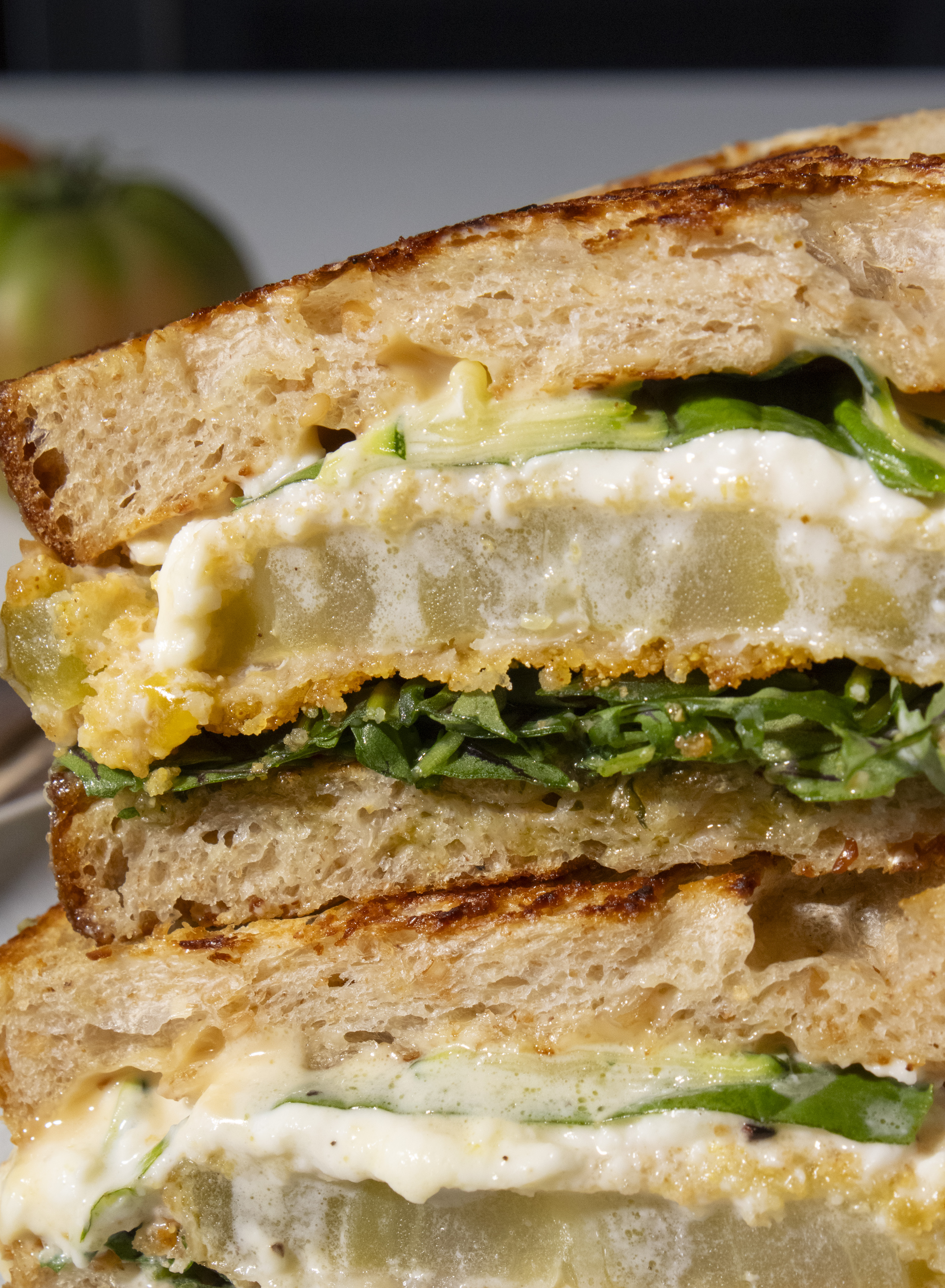 close up of Fried Green Tomato Sandwich cross section