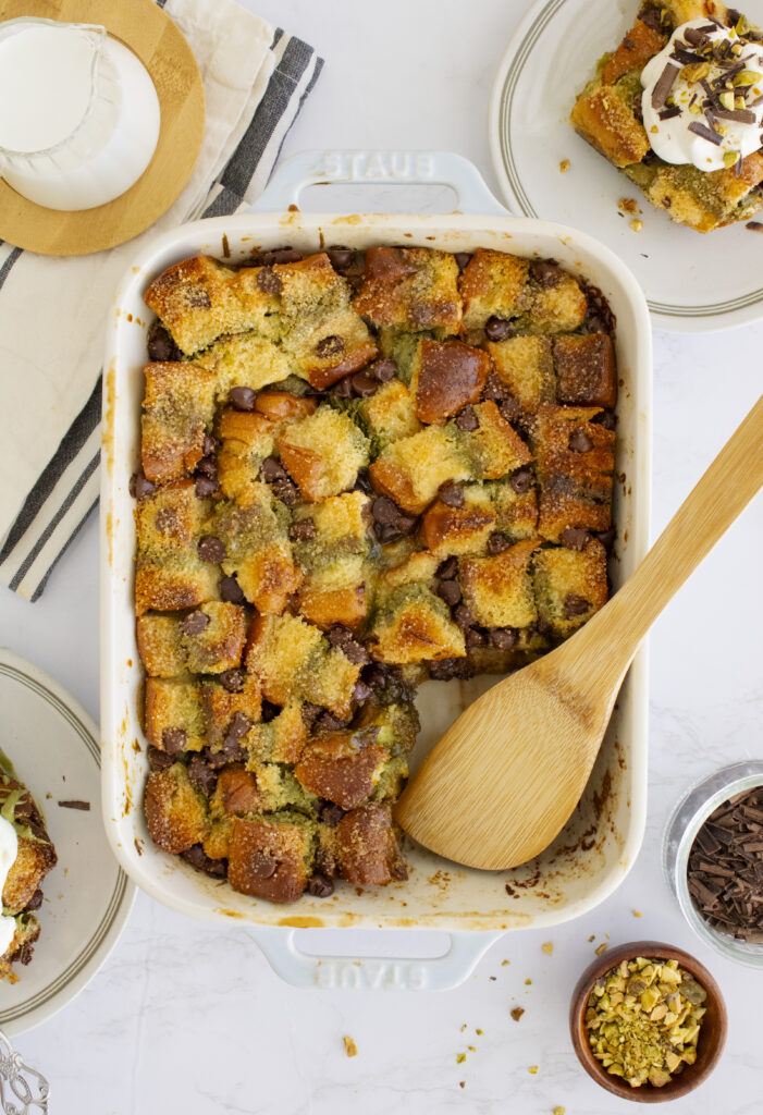 overhead shot of Pistachio Chocolate Bread Pudding in a baking dish