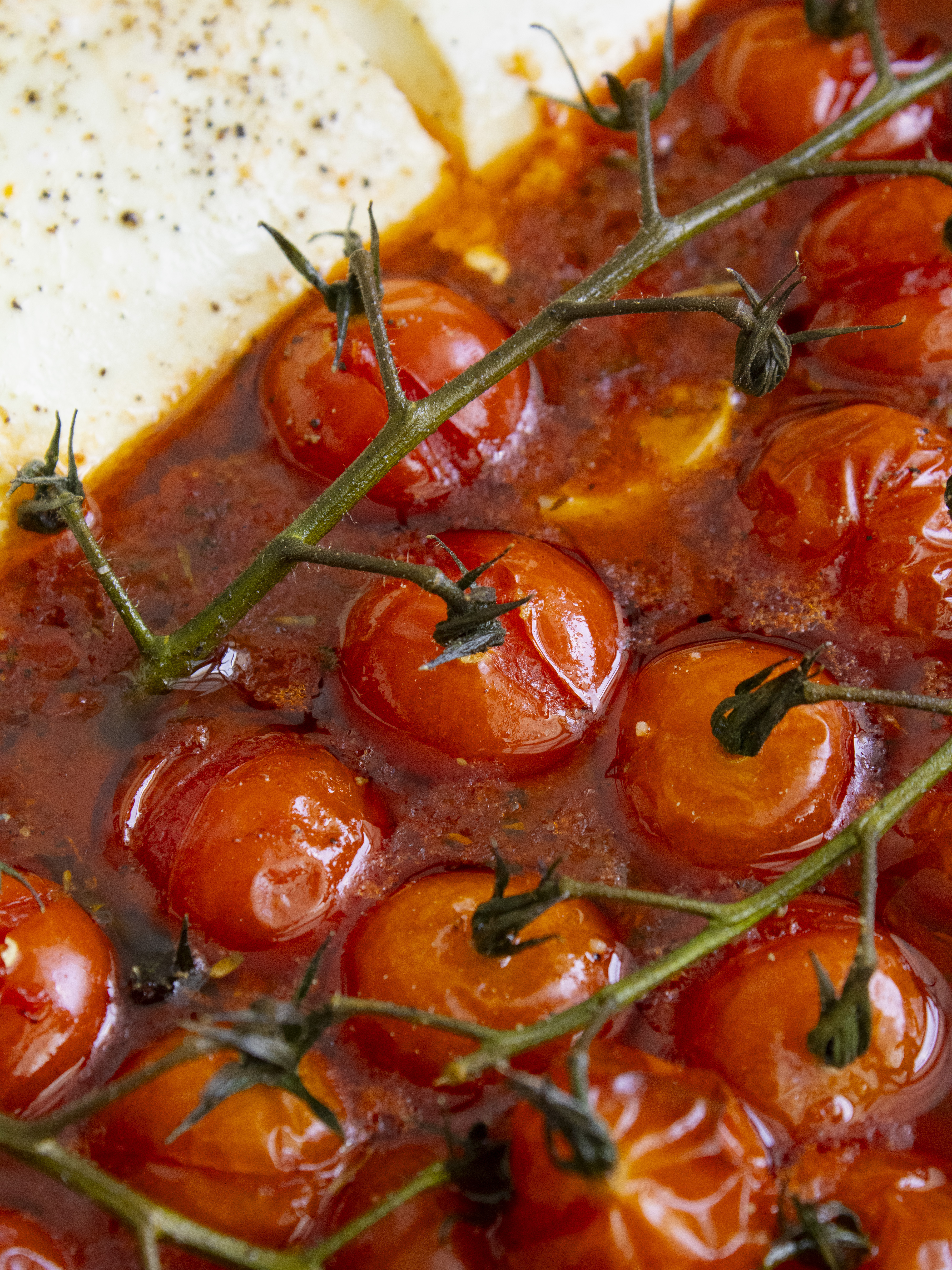 close up of the jammy tomatoes in Baked Tomato Paprika Goat Cheese Dip