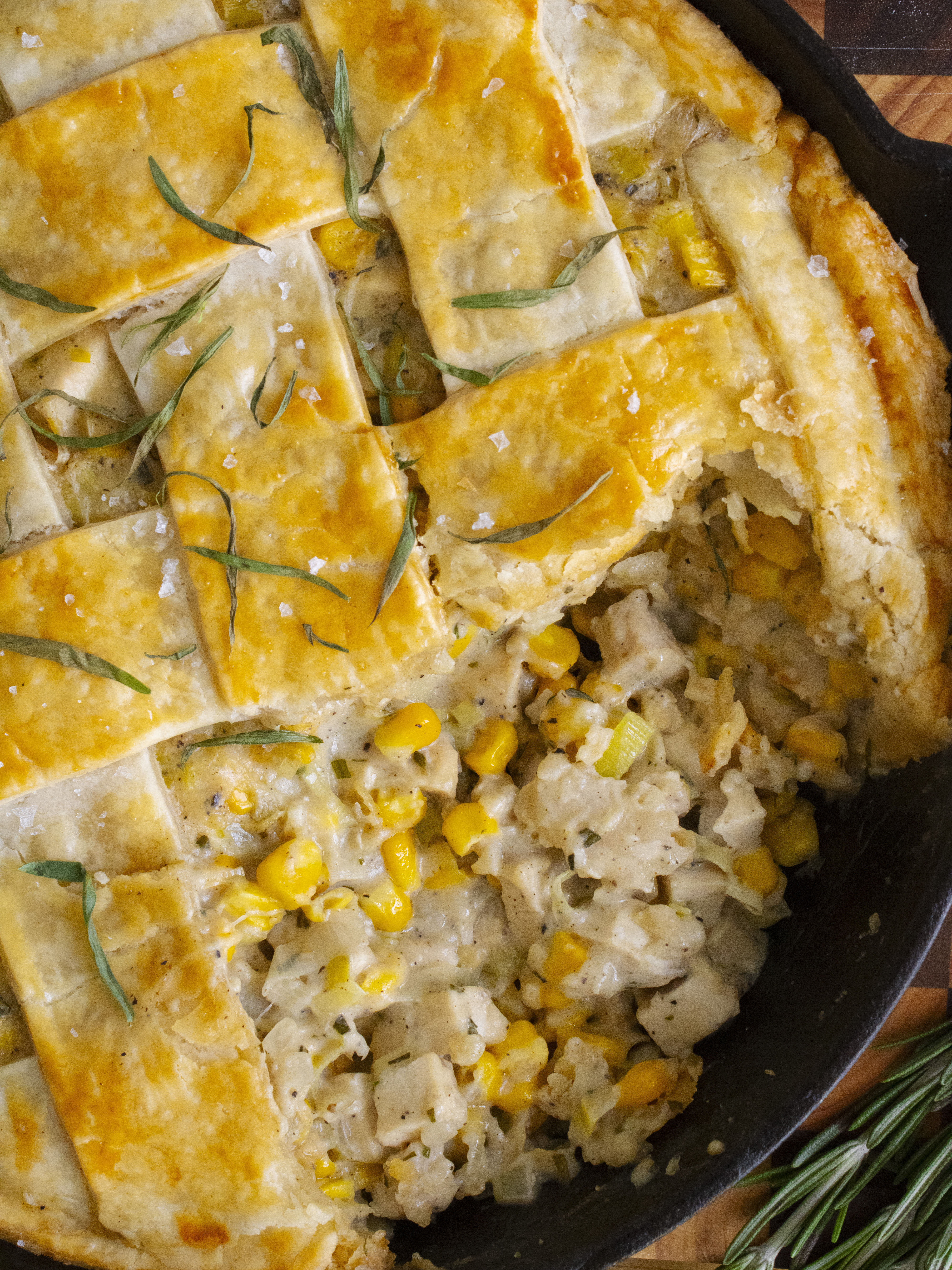 overhead close up of Creamy Chicken and Corn Pie with a scoop taken out