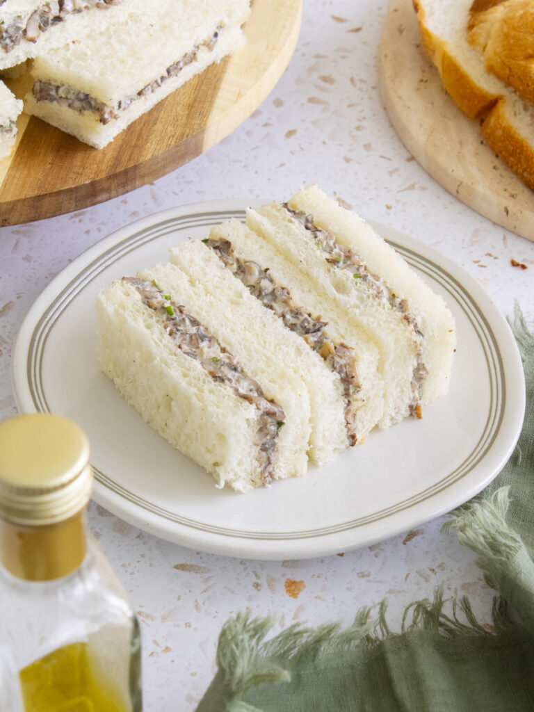3 Truffle Mushroom Tea Sandwiches on a plate