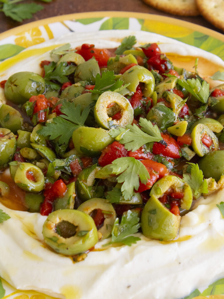 close up of Whipped Ricotta & Olive Dip