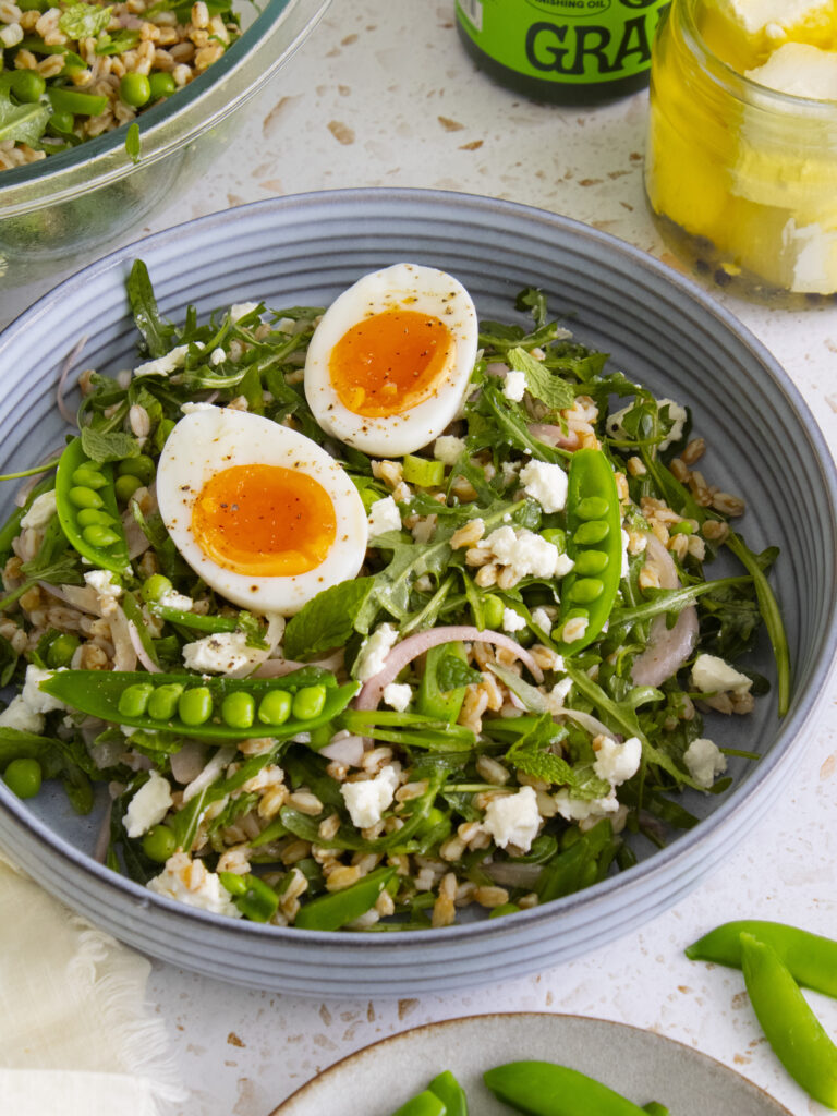 45 degree angle shot of Spring Pea Farro Salad served in a dish