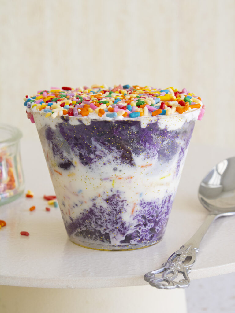 straight on shot of a Ube Funfetti Dot Cake