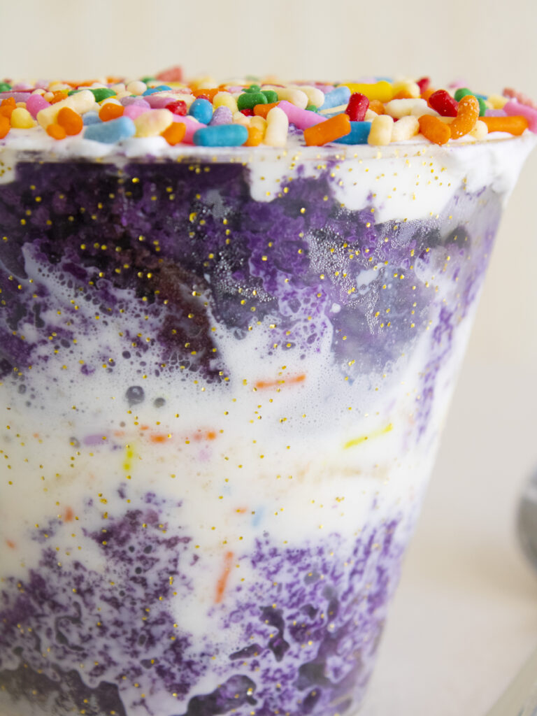 close up of layers in Ube Funfetti Dot Cake
