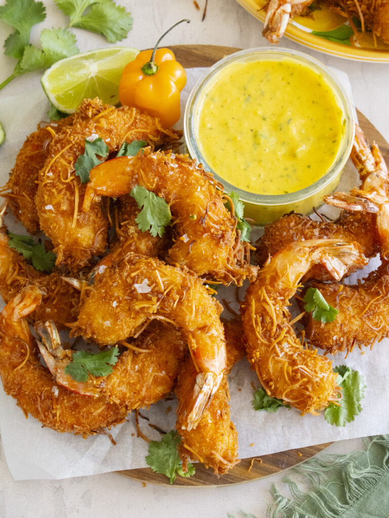 overhead photo of Coconut Shrimp with Mango Habanero Aioli on a platter