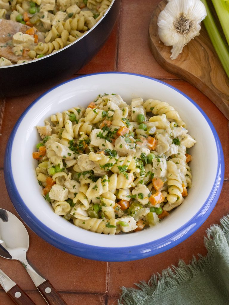 45 degree angle shot of One Pan Chicken Pot Pie Pasta in a bowl