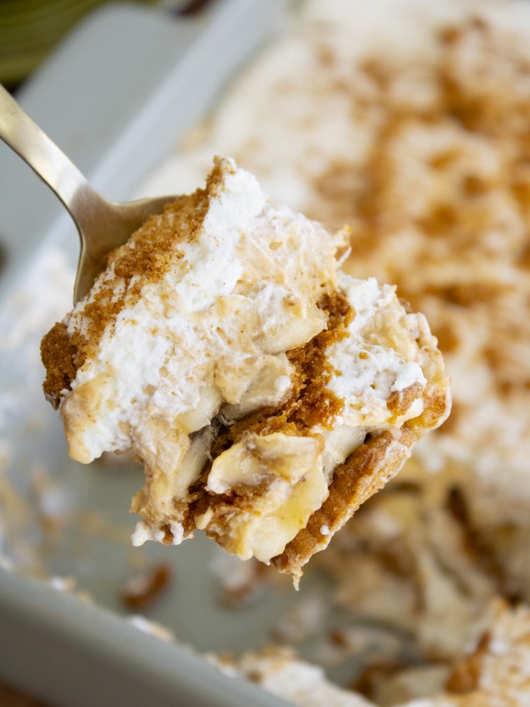 close up of a spoonful of Brown Butter Pumpkin Biscoff Banana Pudding