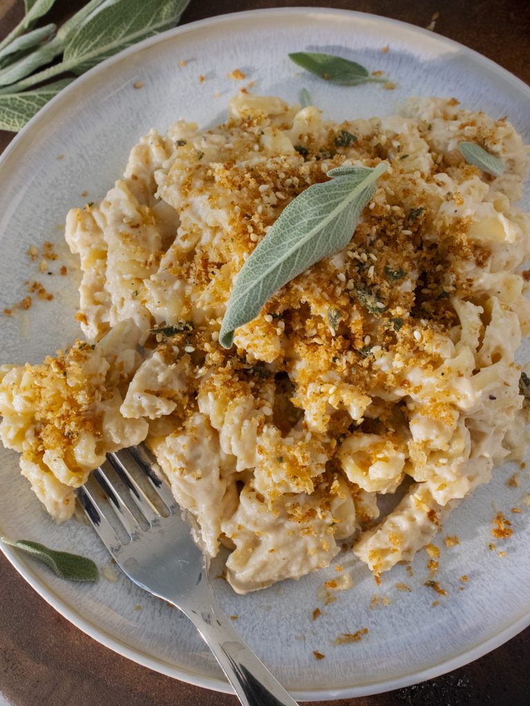 serving of White Cheddar Miso Mac and Cheese on a plate with a fork